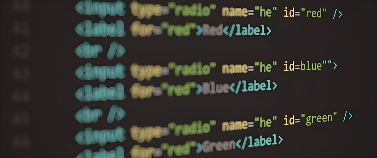 hero-img HTML code displayed on a screen, demonstrating web structure and syntax.